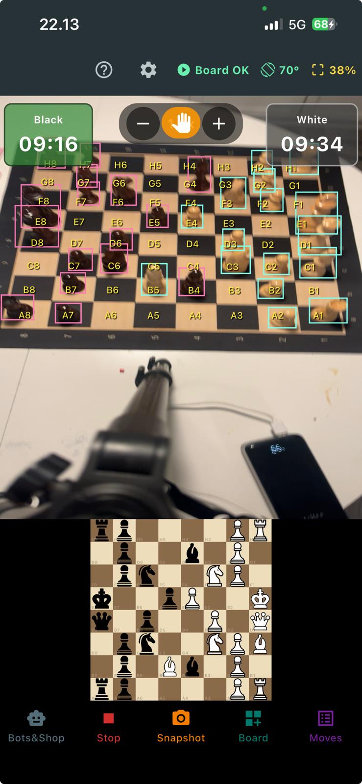 ChessGaze detecting a live chess board — each piece boxed and the position mirrored on the digital board below